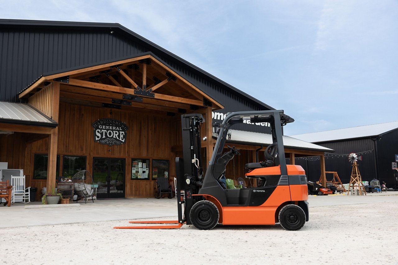 large electric forklift used in outdoor retail environment 